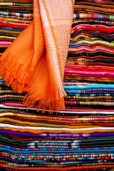 colorful scarves in a Quito market